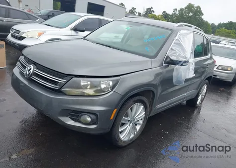 2014 Volkswagen Tiguan Se from USA, damaged, VIN WVGAV3AX9EW625175